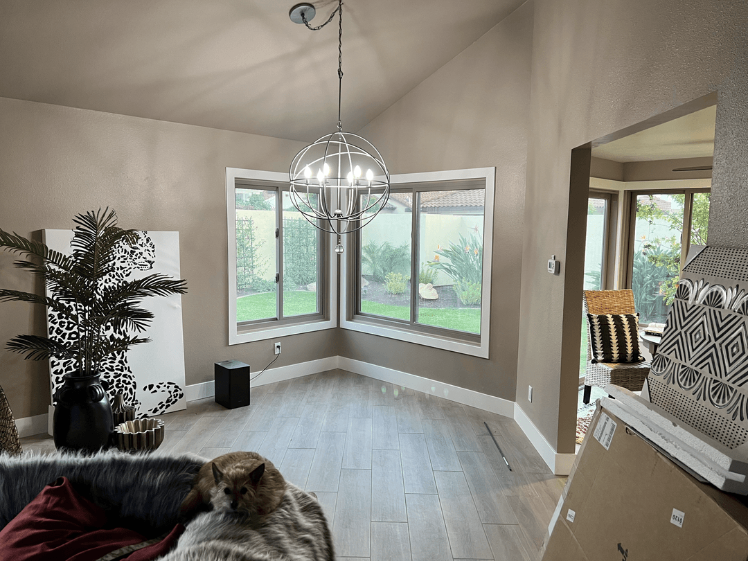 Finished living room with new interior paint and natural lighting